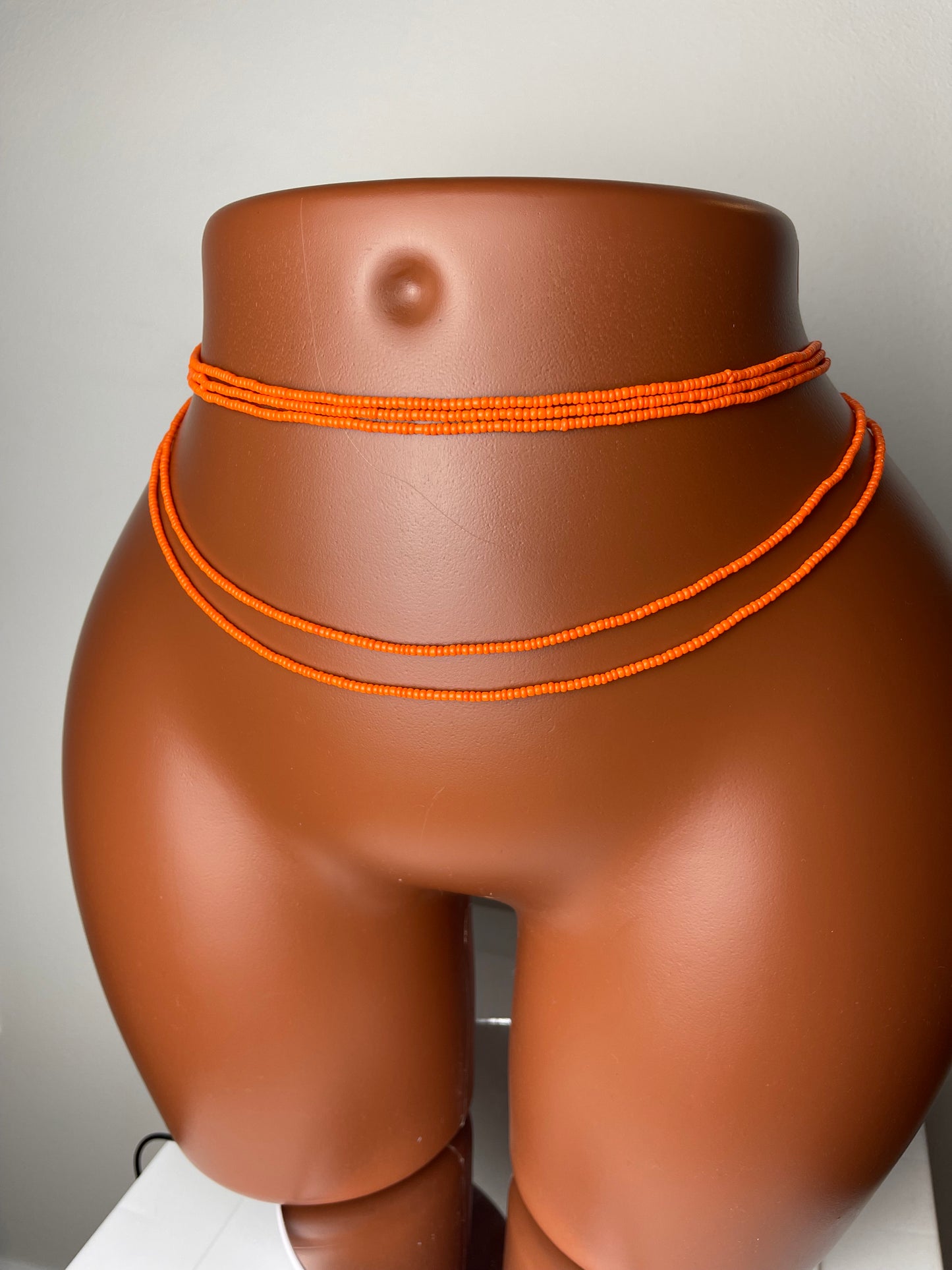 Solid orange waistbeads