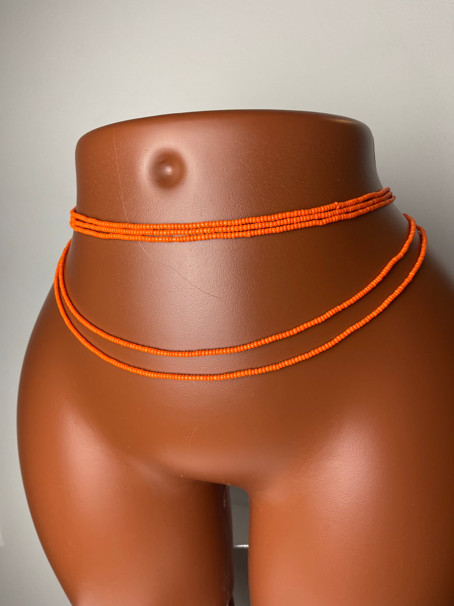 Solid orange waistbeads