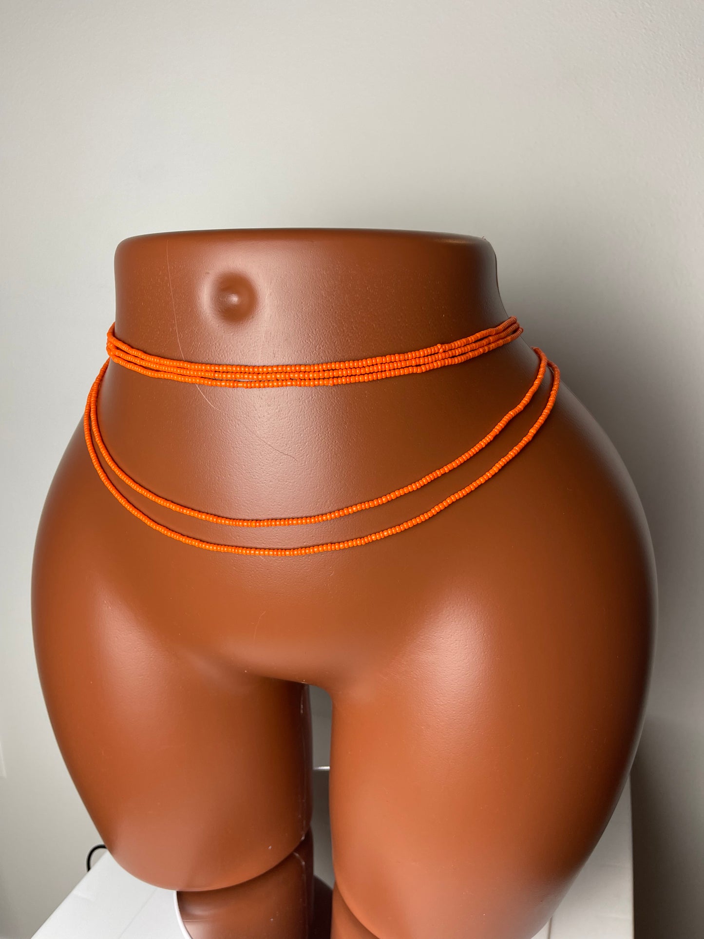Solid orange waistbeads