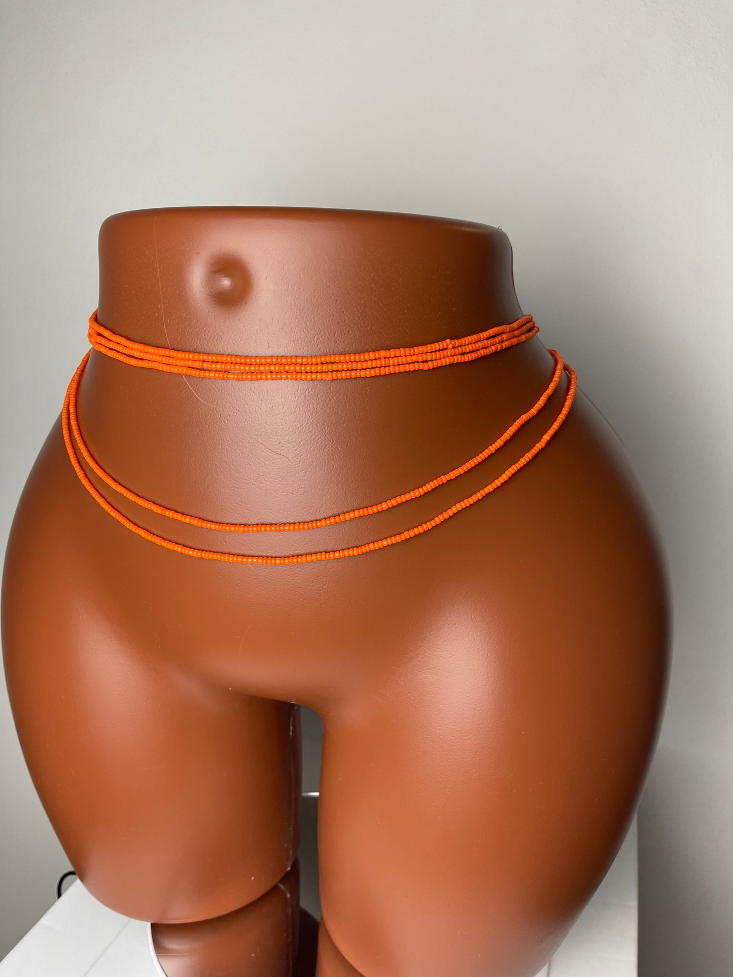 Solid orange waistbeads