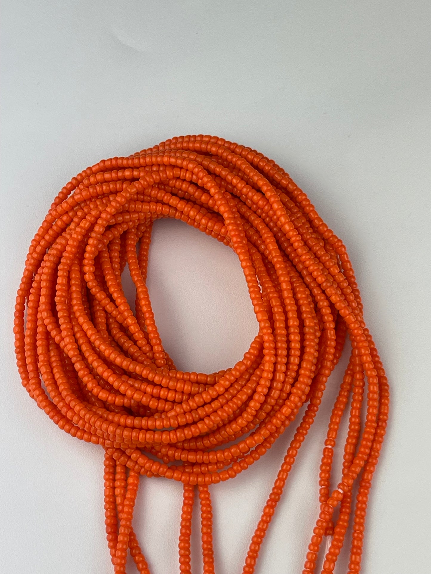 Solid orange waistbeads