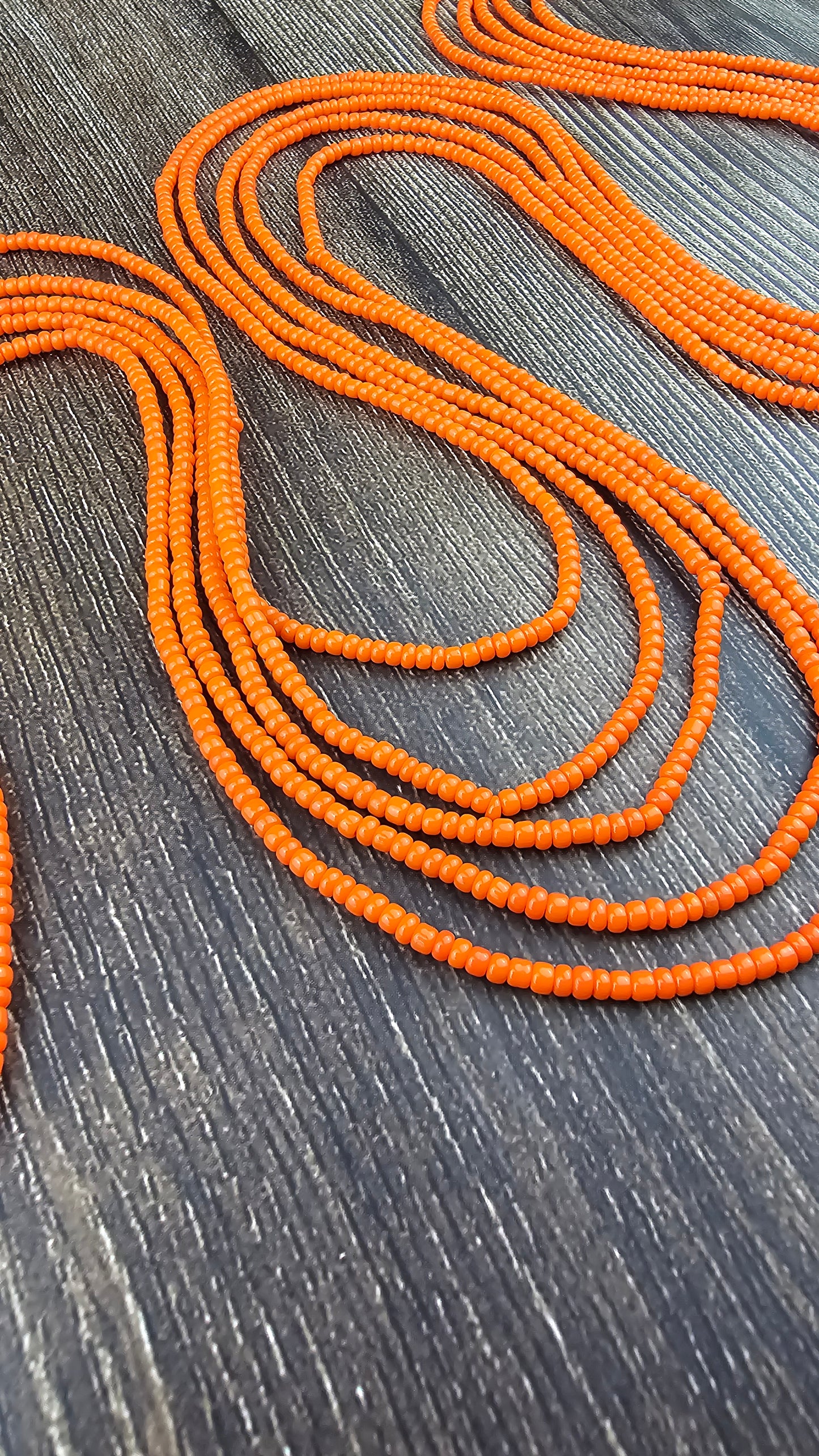 Solid orange waistbeads